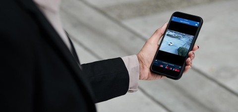 a mobile surveillance camera installed on a wall 